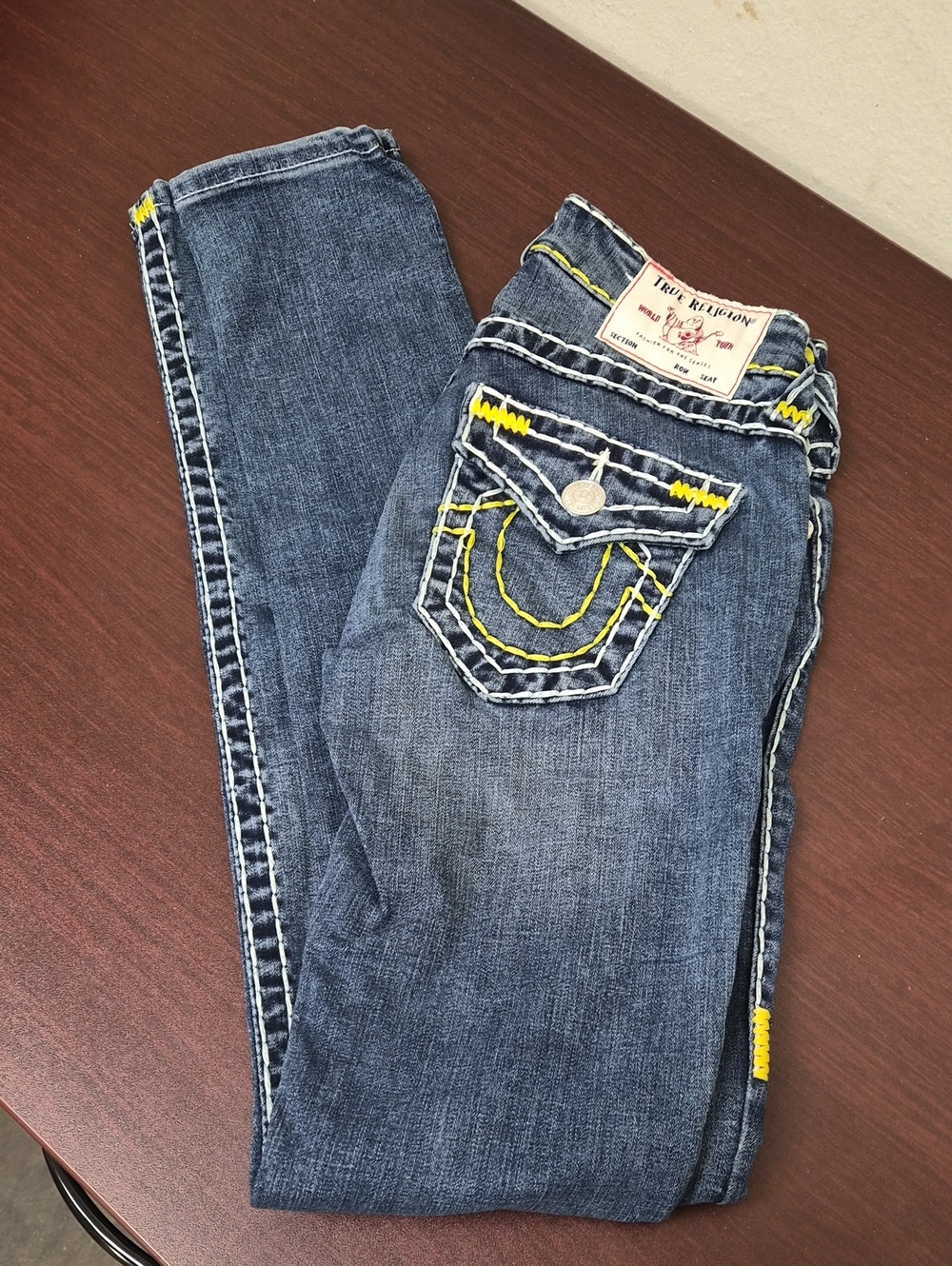 True Religion Skinny Jeans in Blue with Yellow Stitching Size 24